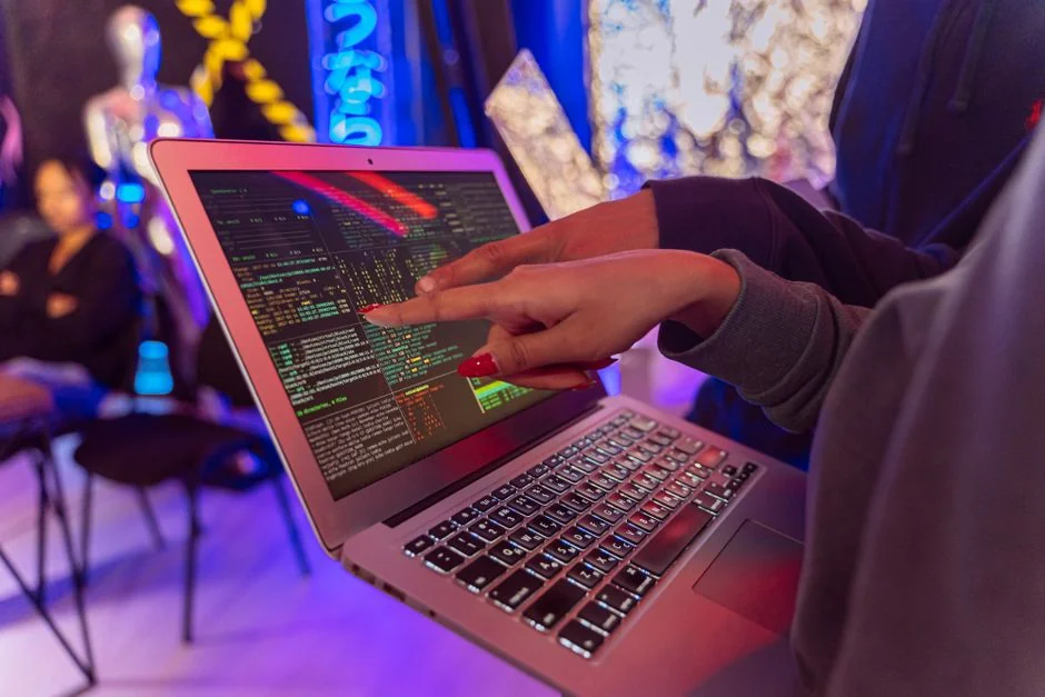 A person using a laptop to browse stock photo websites. Freelancing work in a cozy setting.